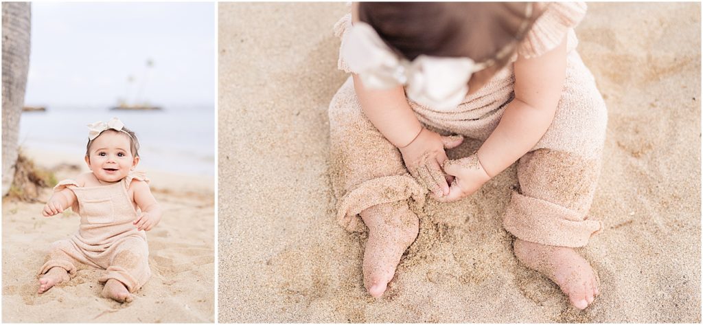 Cute baby girl playing in the sand at The Kahala Hotel, Oahu